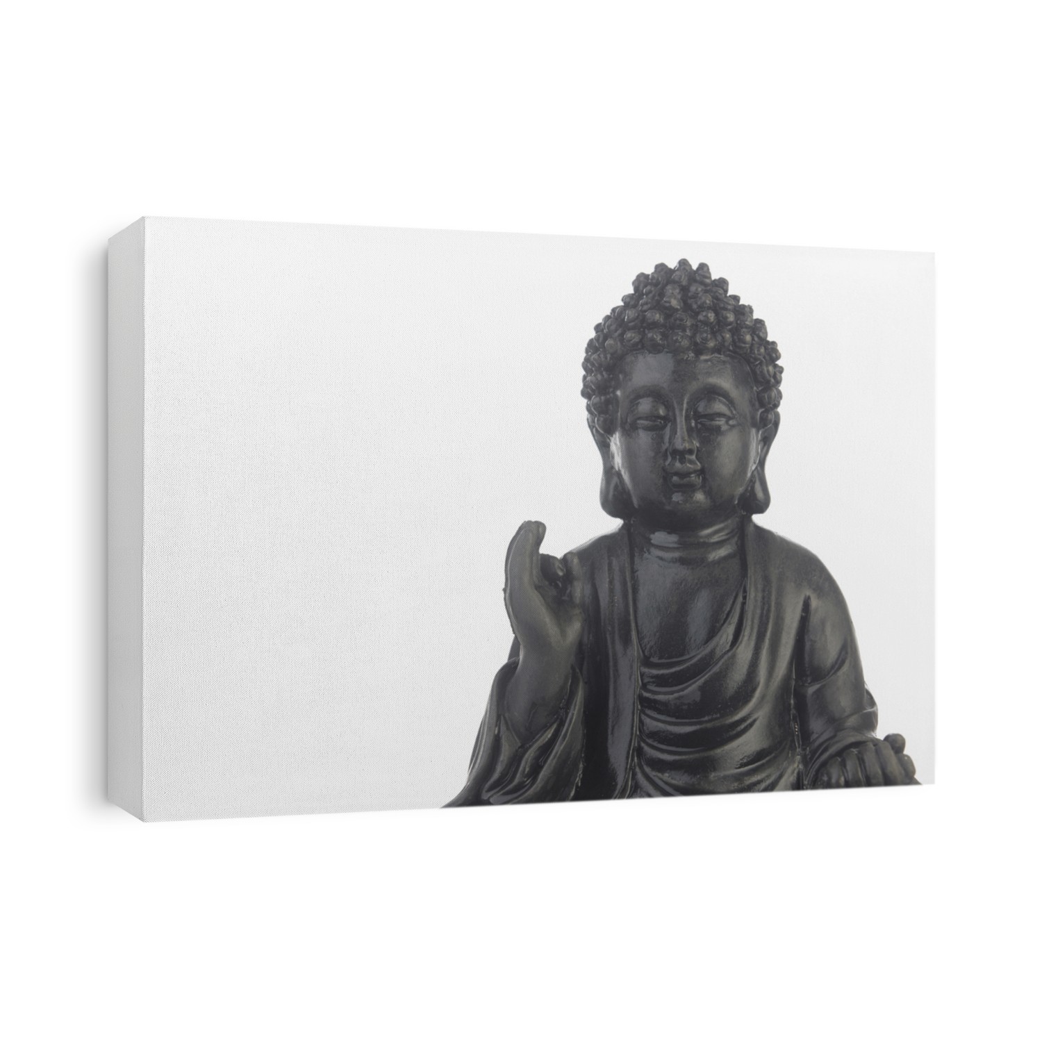 black Buddha statue in a sitting position on the white background